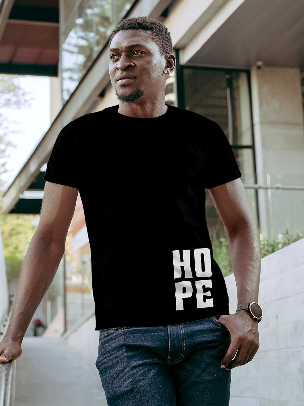Model wearing Men's Black Round Neck T-shirt with 'Hope' design, offering effortless style and premium comfort