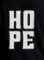 Close up of 'Hope' design on Women's Black Round Neck T-shirt, highlighting intricate details and vibrant print.