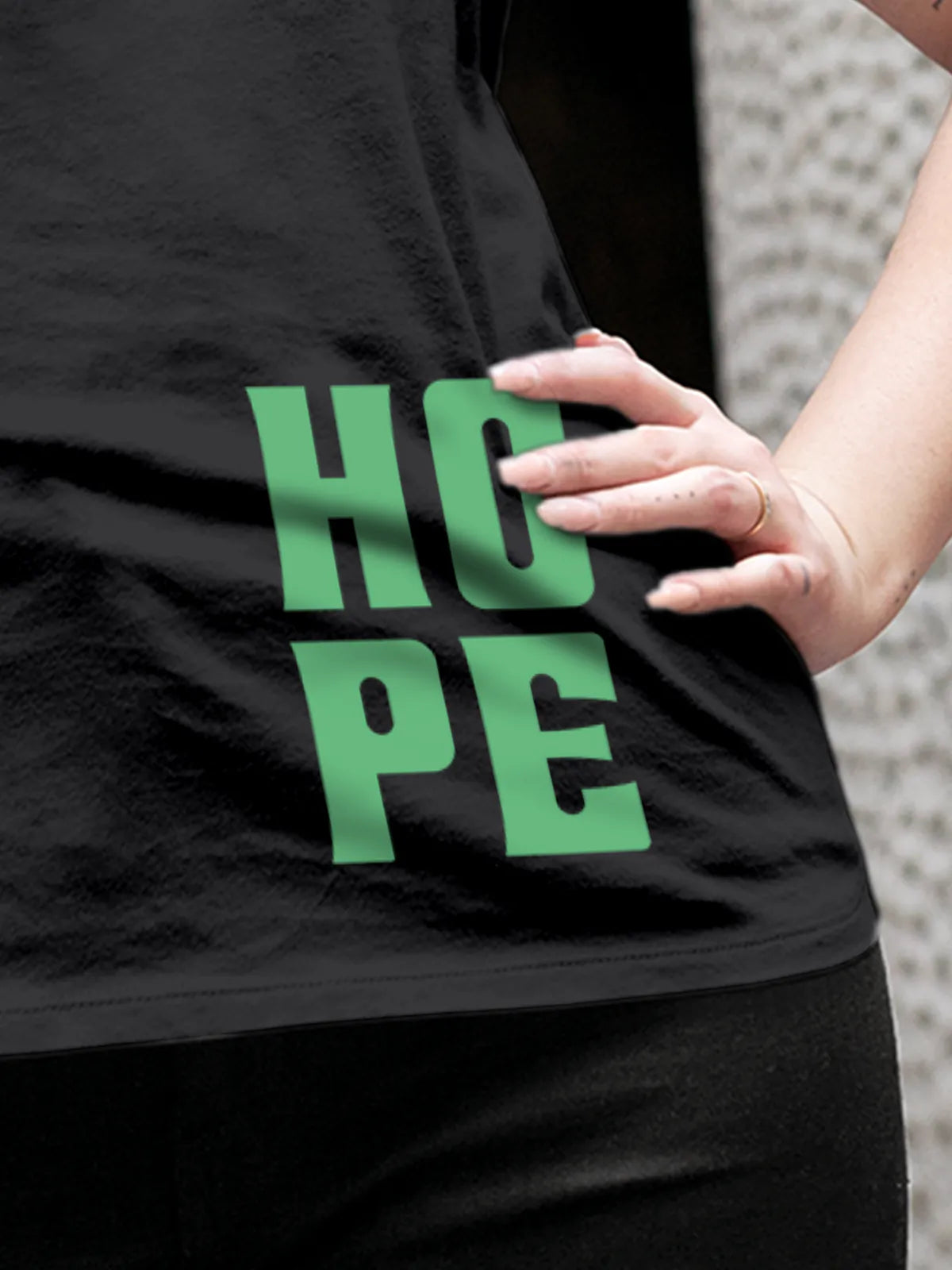 Close up of 'Hope' design on Women's Dark Grey Round Neck T-shirt, highlighting intricate details and vibrant print.