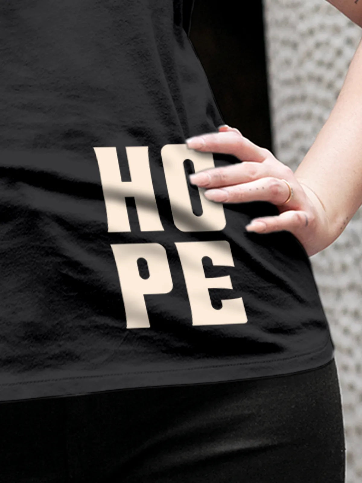 Close up of 'Hope' design on Women's Dark Grey Round Neck T-shirt, highlighting intricate details and vibrant print.