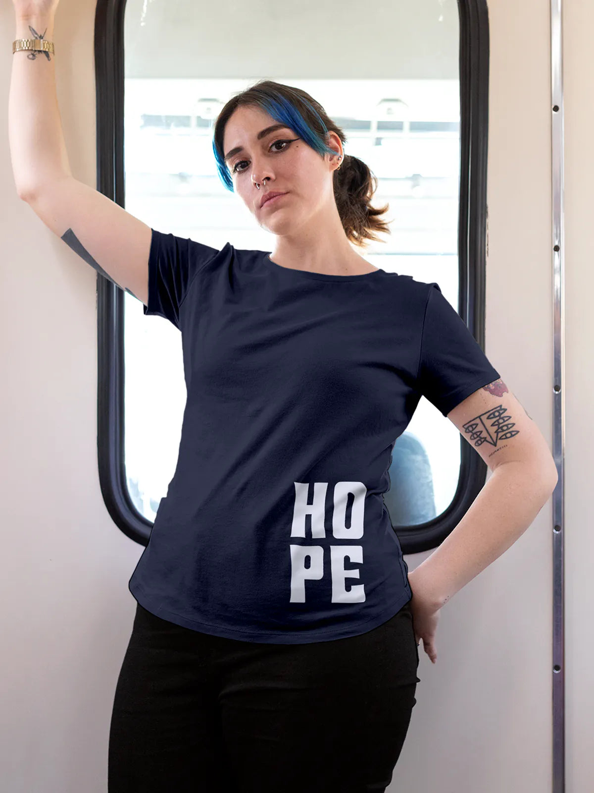 Model wearing Women's Navy Blue Round Neck T-shirt with 'Hope' design, offering effortless style and premium comfort
