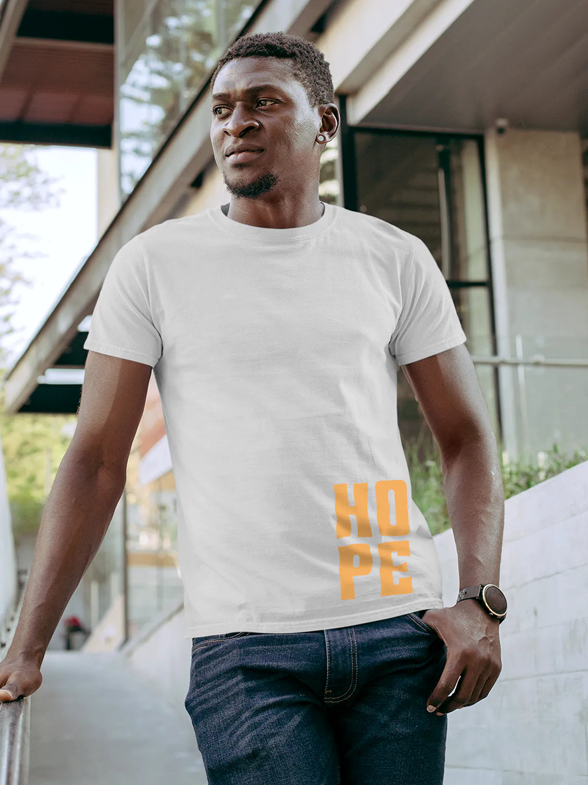 Model wearing Men's White Round Neck T-shirt with 'Hope' design, offering effortless style and premium comfort