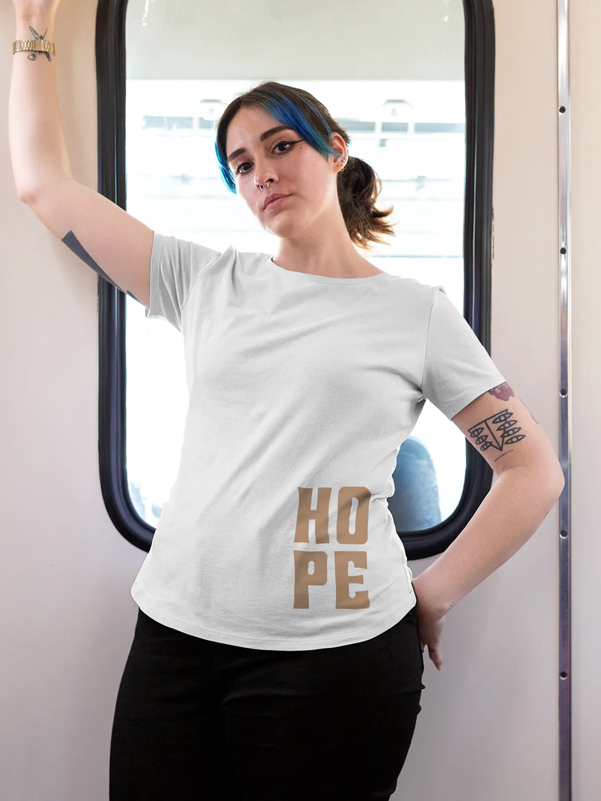 Model wearing Women's White Round Neck T-shirt with 'Hope' design, offering effortless style and premium comfort
