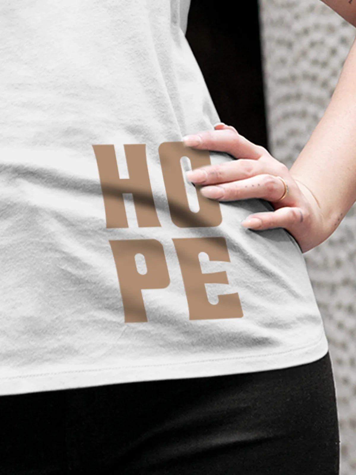 Close up of 'Hope' design on Women's White Round Neck T-shirt, highlighting intricate details and vibrant print.