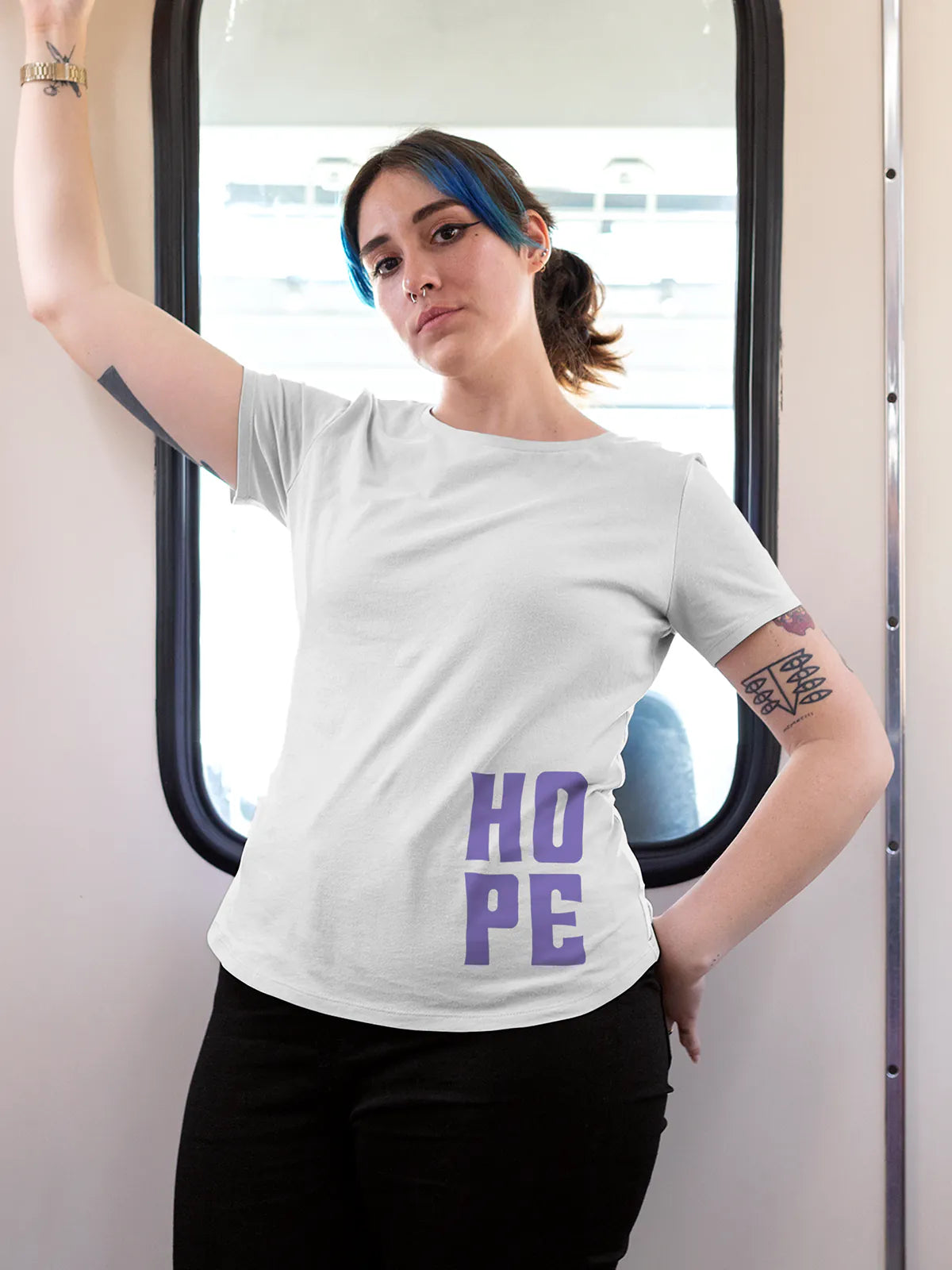 Model wearing Women's White Round Neck T-shirt with 'Hope' design, offering effortless style and premium comfort