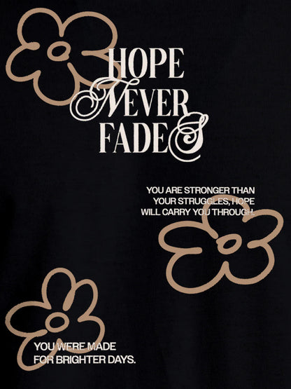 Close up of 'Hope Never Fades' design on Women's Black Round Neck T-shirt, highlighting intricate details and vibrant print.
