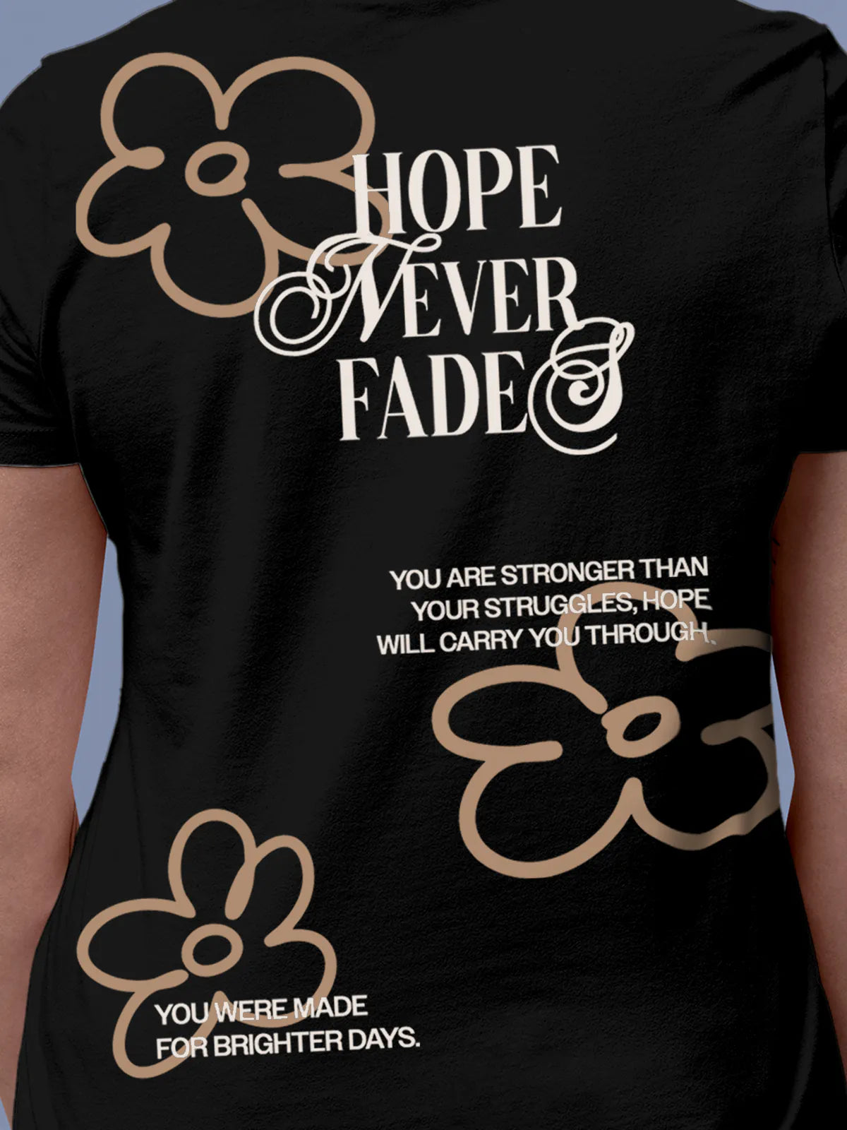 Close up of 'Hope Never Fades' design on Women's Black Round Neck T-shirt, highlighting intricate details and vibrant print.