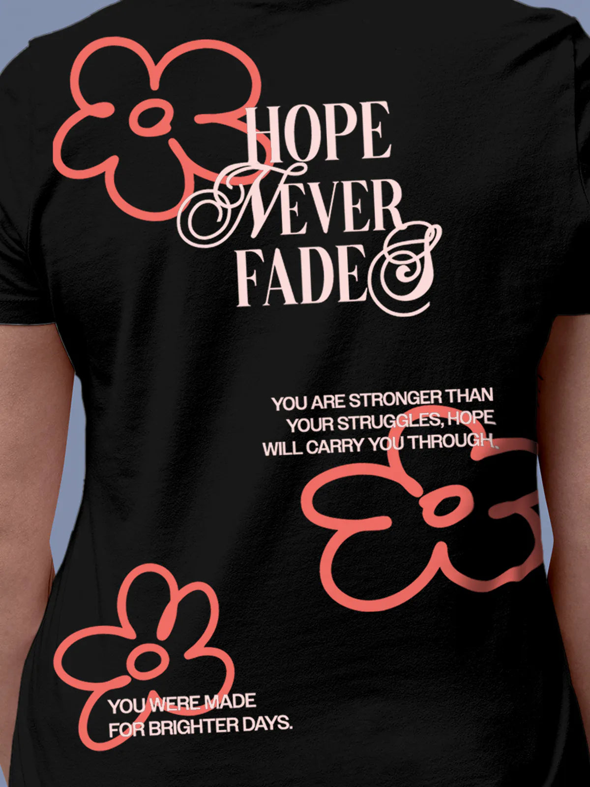 Close up of 'Hope Never Fades' design on Women's Black Round Neck T-shirt, highlighting intricate details and vibrant print.