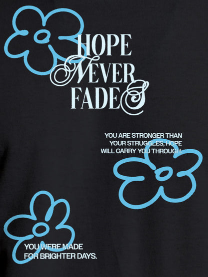 Close up of 'Hope Never Fades' design on Women's Dark Grey Round Neck T-shirt, highlighting intricate details and vibrant print.