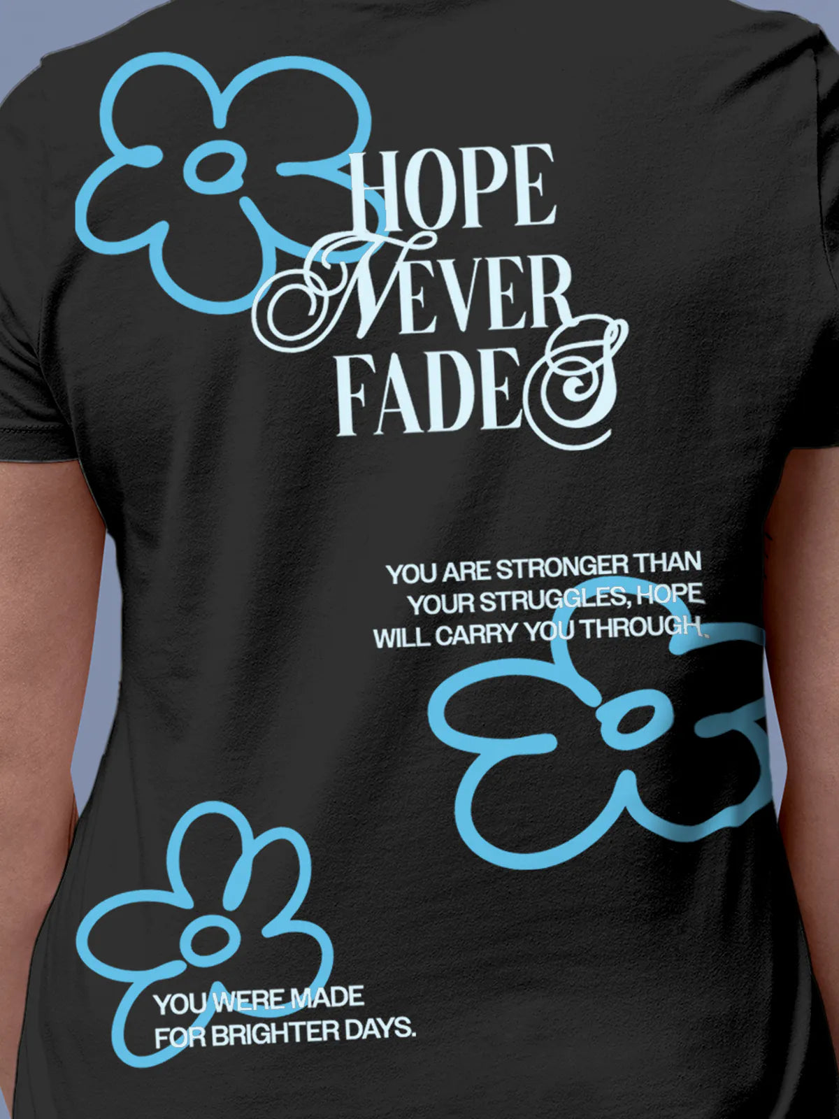 Close up of 'Hope Never Fades' design on Women's Dark Grey Round Neck T-shirt, highlighting intricate details and vibrant print.
