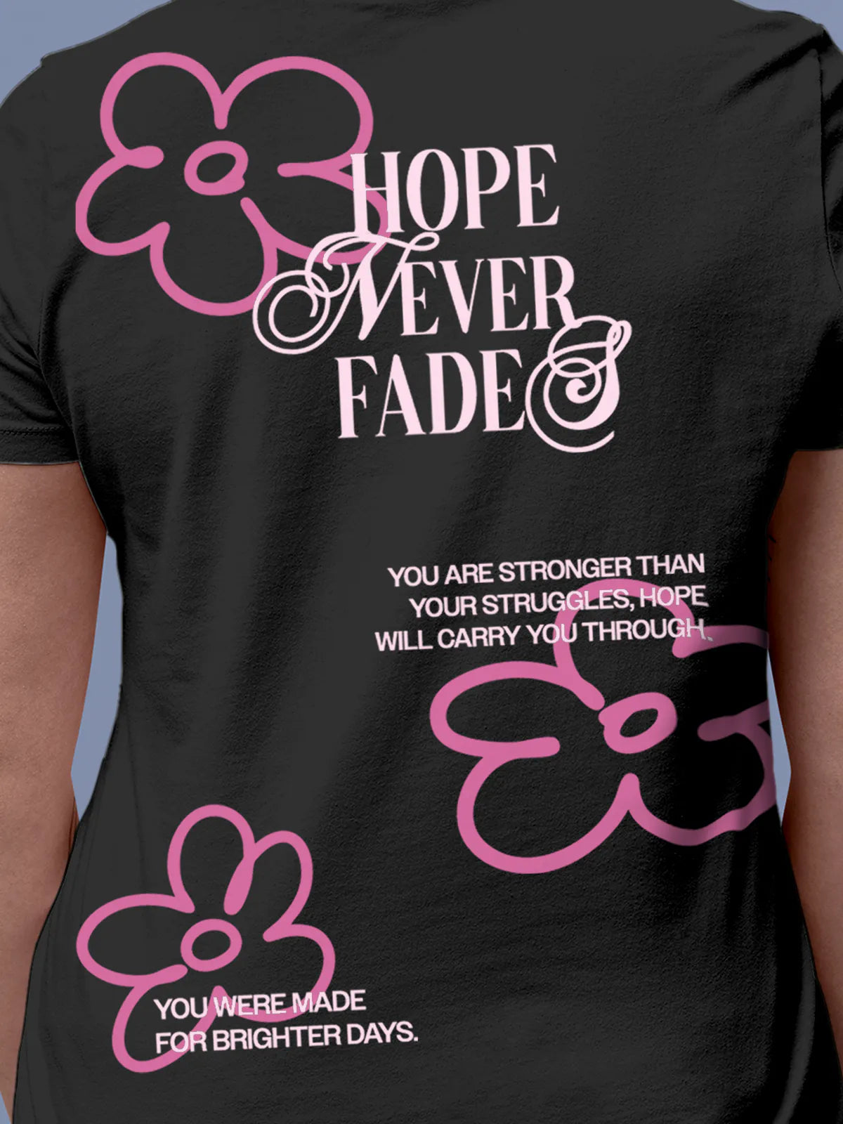 Close up of 'Hope Never Fades' design on Women's Dark Grey Round Neck T-shirt, highlighting intricate details and vibrant print.