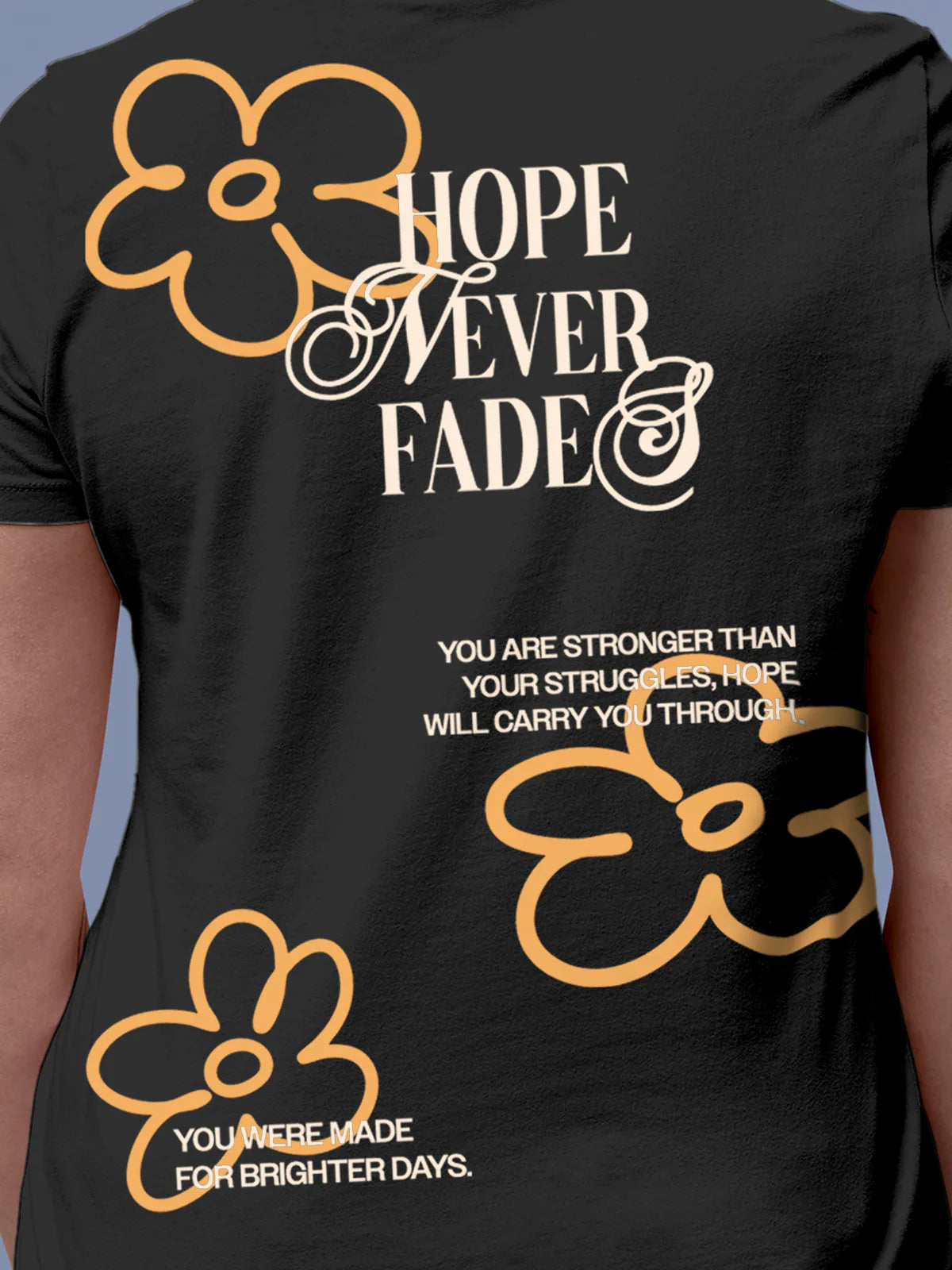 Close up of 'Hope Never Fades' design on Women's Dark Grey Round Neck T-shirt, highlighting intricate details and vibrant print.