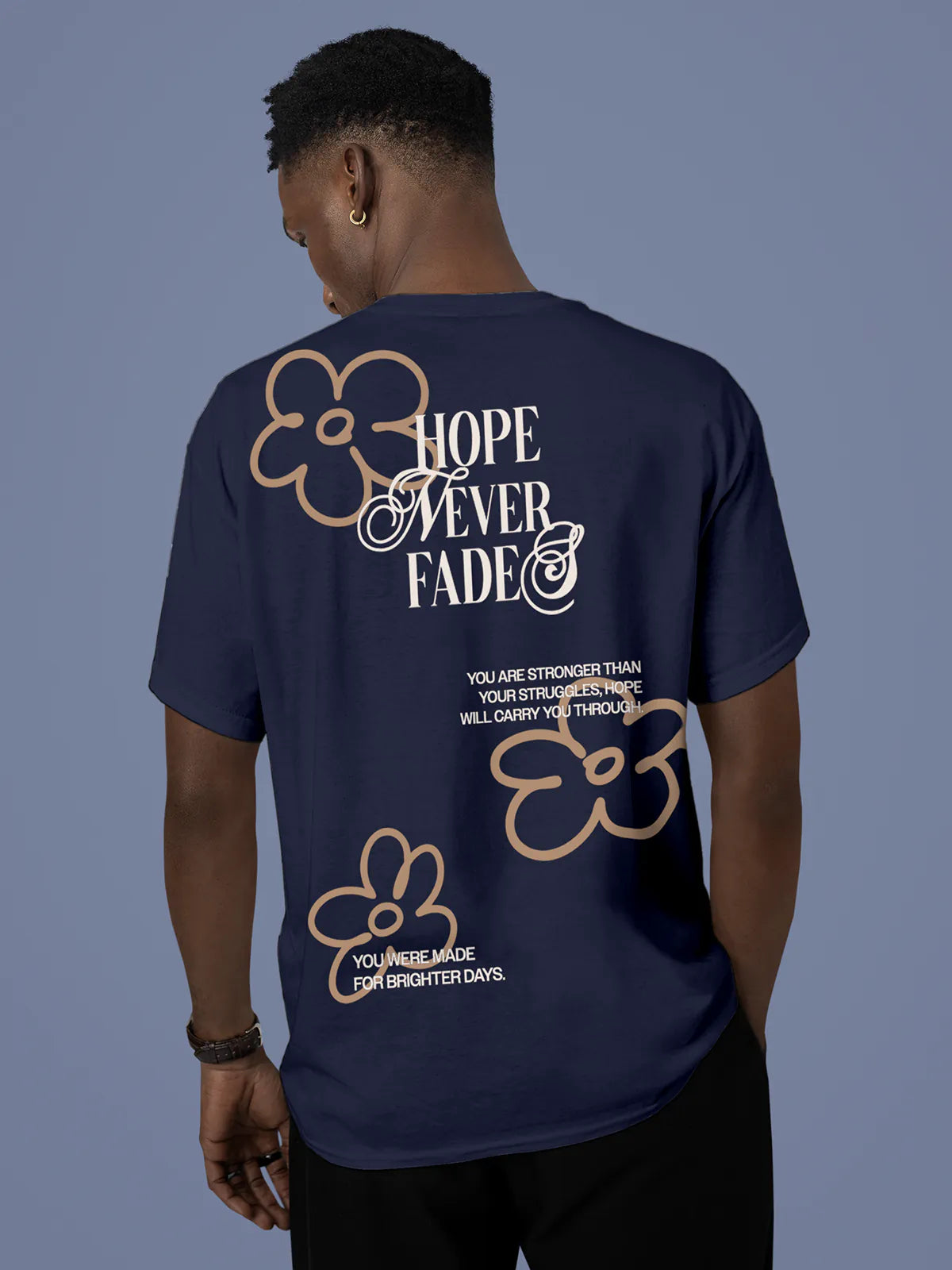 Model wearing Men's Navy Blue Round Neck T-shirt with 'Hope Never Fades' design, offering effortless style and premium comfort