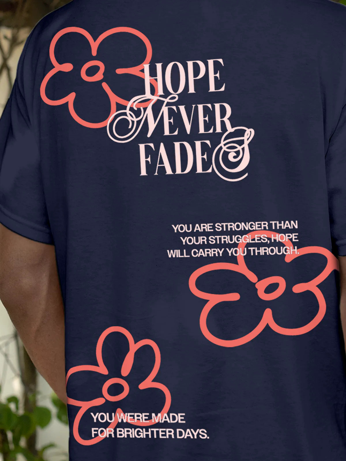 Close up of 'Hope Never Fades' design on Men's Navy Blue Round Neck T-shirt, highlighting intricate details and vibrant print.