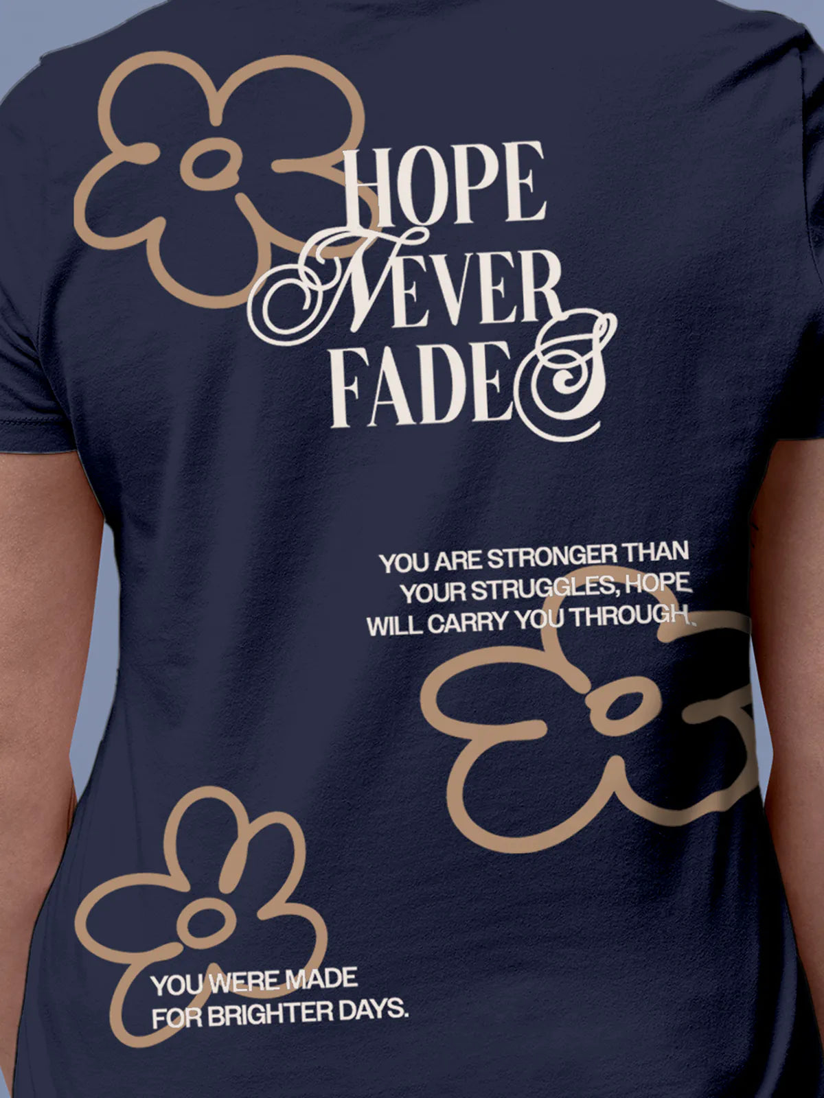 Close up of 'Hope Never Fades' design on Women's Navy Blue Round Neck T-shirt, highlighting intricate details and vibrant print.
