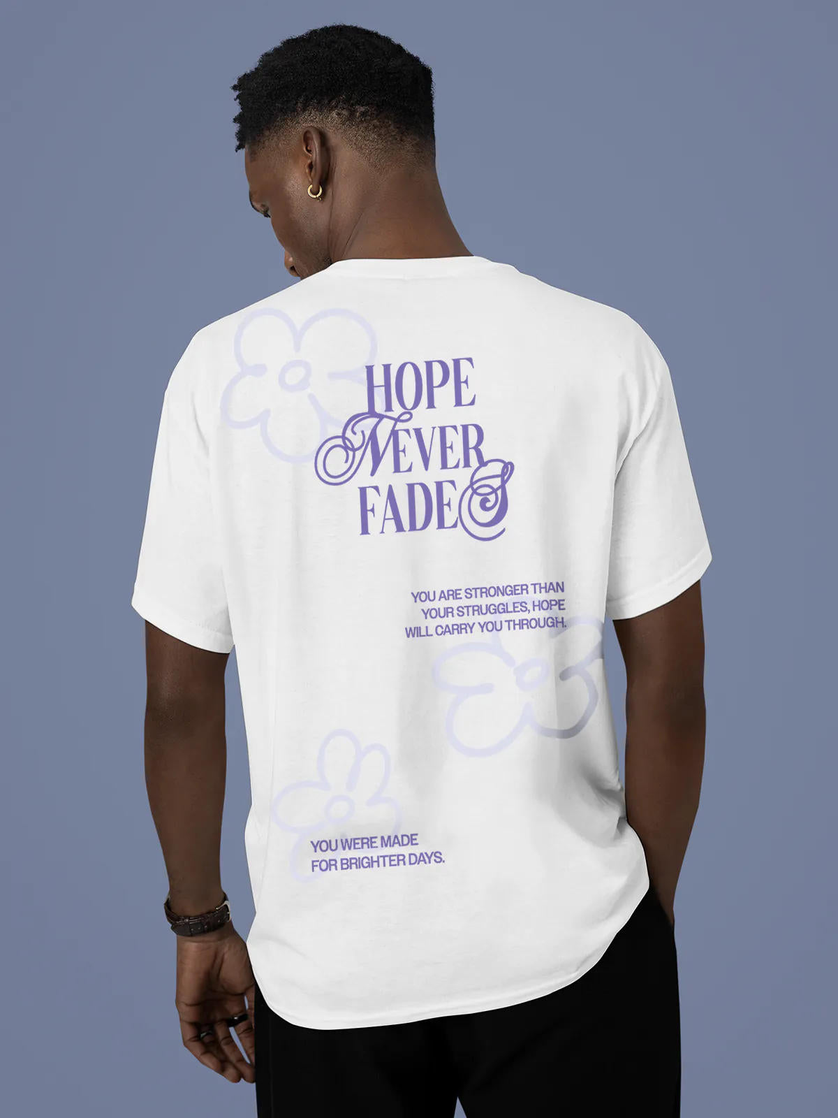 Model wearing Men's White Round Neck T-shirt with 'Hope Never Fades' design, offering effortless style and premium comfort