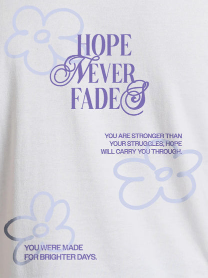 Close up of 'Hope Never Fades' design on Men's White Round Neck T-shirt, highlighting intricate details and vibrant print.