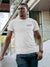Front view of Fighterhero Men's White Round Neck T-shirt, highlighting the 'broken chains' design on the chest.
