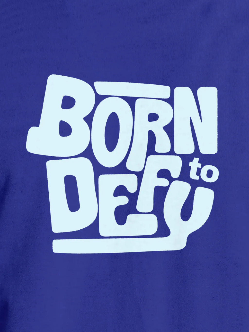 Close up of 'Born To Defy' design on Men's Blue Round Neck T-shirt, highlighting intricate details and vibrant print.
