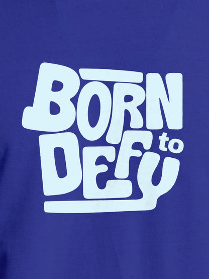 Close up of 'Born To Defy' design on Men's Blue Round Neck T-shirt, highlighting intricate details and vibrant print.