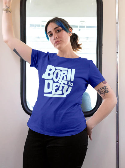 Model wearing Women's Blue Round Neck T-shirt with 'Born To Defy' design, offering effortless style and premium comfort