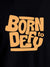 Close up of 'Born To Defy' design on Men's Black Round Neck T-shirt, highlighting intricate details and vibrant print.
