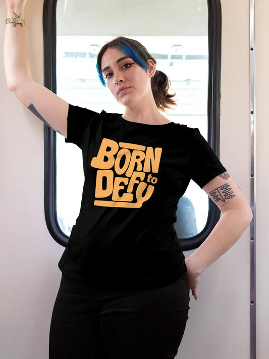 Model wearing Women's Black Round Neck T-shirt with 'Born To Defy' design, offering effortless style and premium comfort