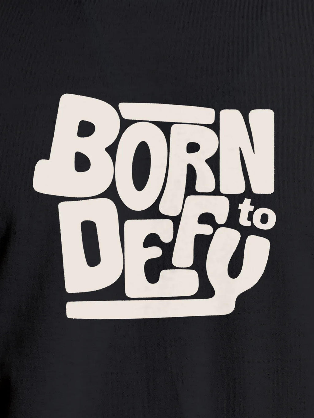 Close up of 'Born To Defy' design on Men's Dark Grey Round Neck T-shirt, highlighting intricate details and vibrant print.