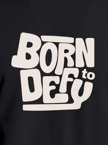 Close up of 'Born To Defy' design on Men's Dark Grey Round Neck T-shirt, highlighting intricate details and vibrant print.