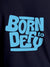 Close up of 'Born To Defy' design on Women's Navy Blue Round Neck T-shirt, highlighting intricate details and vibrant print.