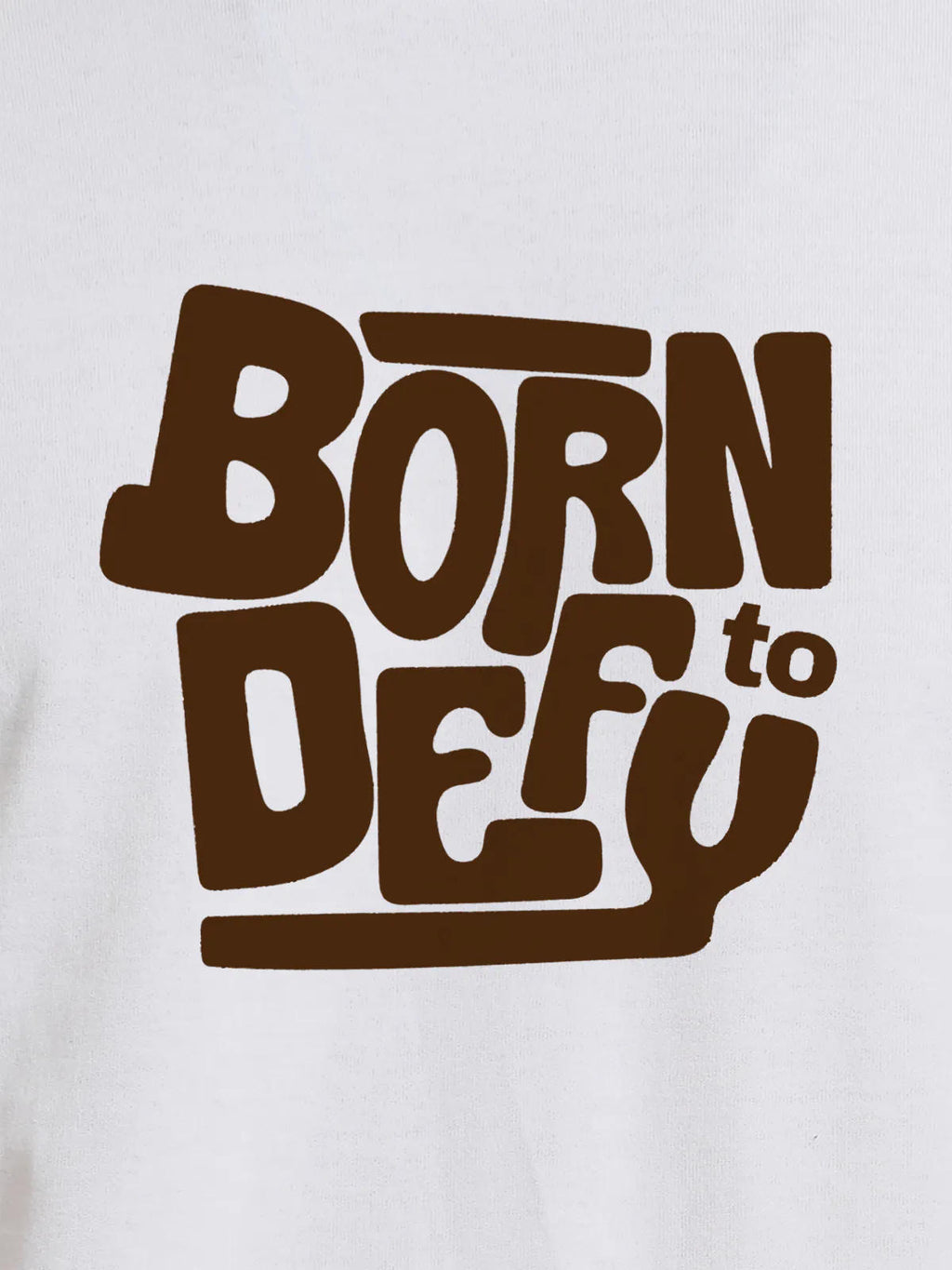 Close up of 'Born To Defy' design on Men's White Round Neck T-shirt, highlighting intricate details and vibrant print.