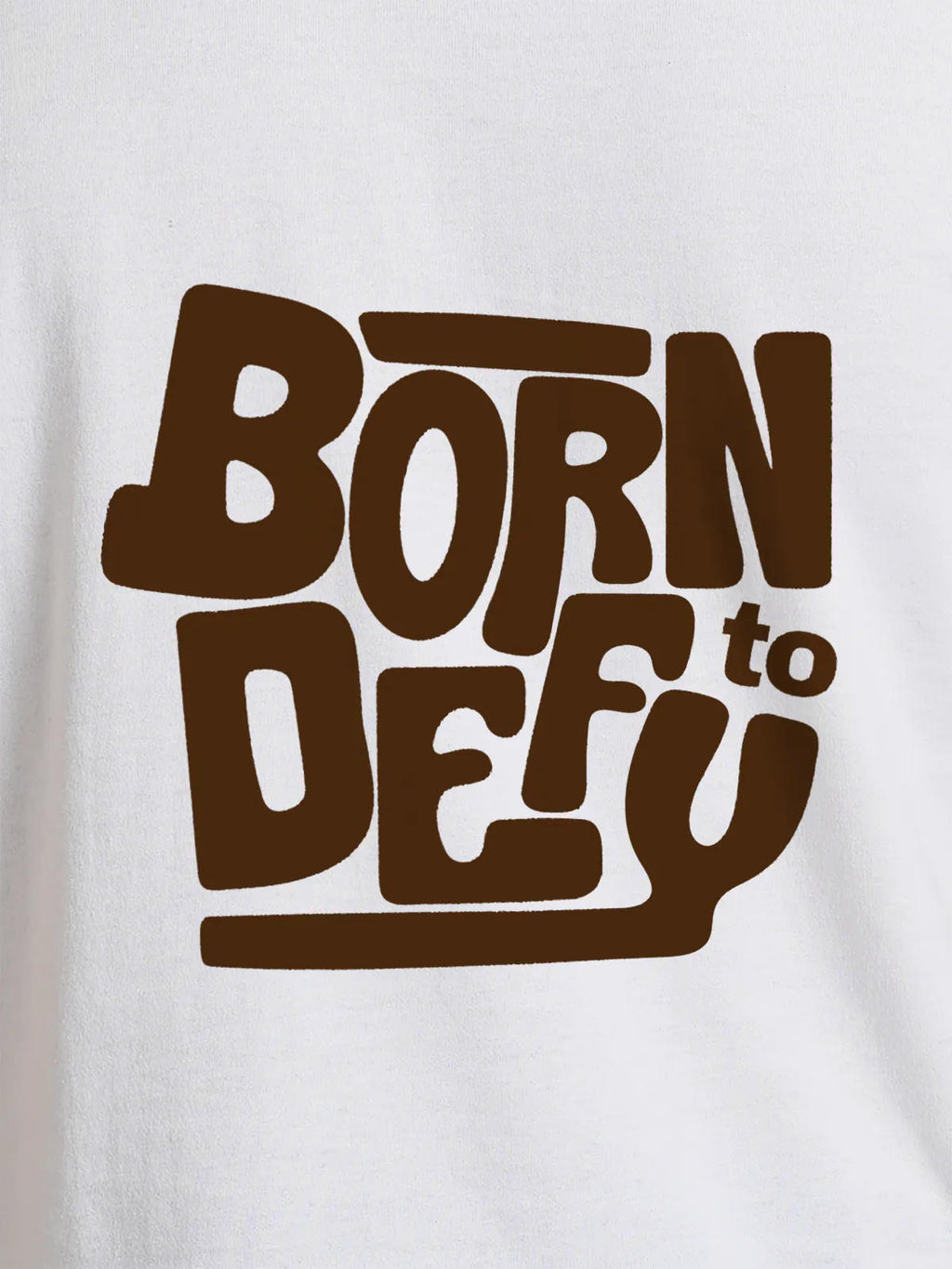 Close up of 'Born To Defy' design on Women's White Round Neck T-shirt, highlighting intricate details and vibrant print.