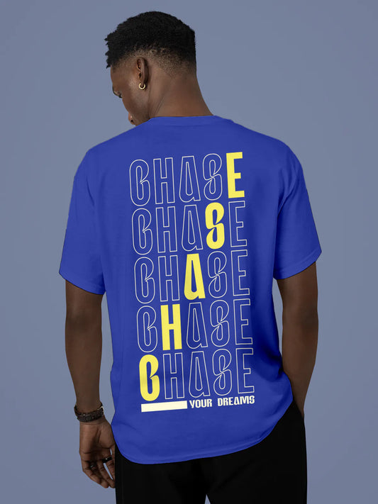 Fighterhero T-shirts: Model wearing Men's Blue Round Neck T-shirt with 'Chase Your Dreams' design