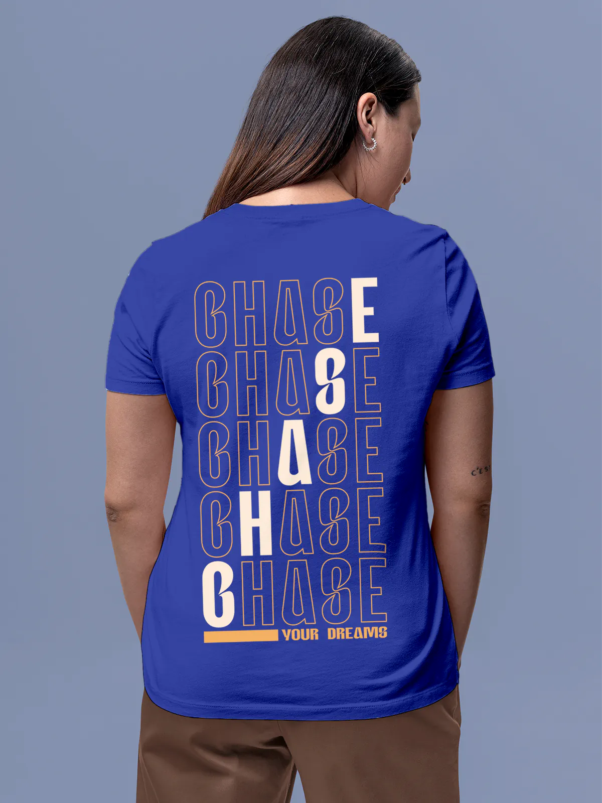 Model wearing Women's Blue Round Neck T-shirt with 'Chase Your Dreams' design, offering effortless style and premium comfort