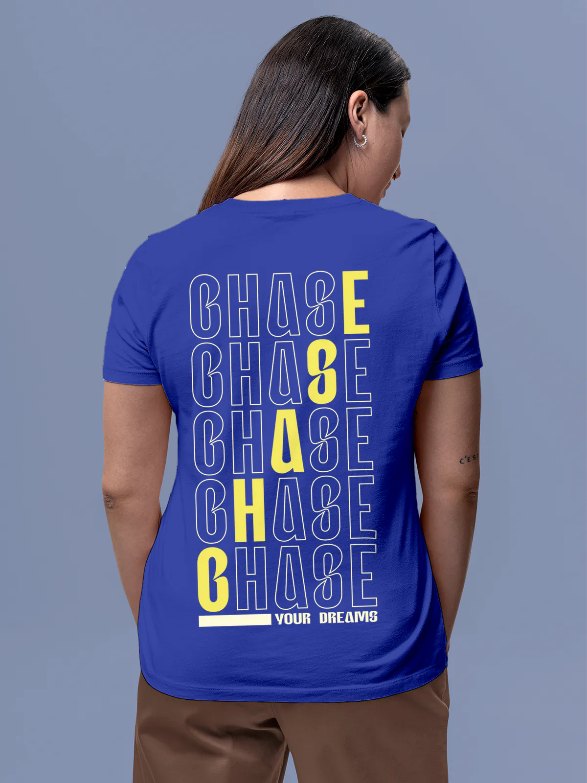 Fighterhero T-shirts: Model wearing Women's Blue Round Neck T-shirt with 'Chase Your Dreams' design