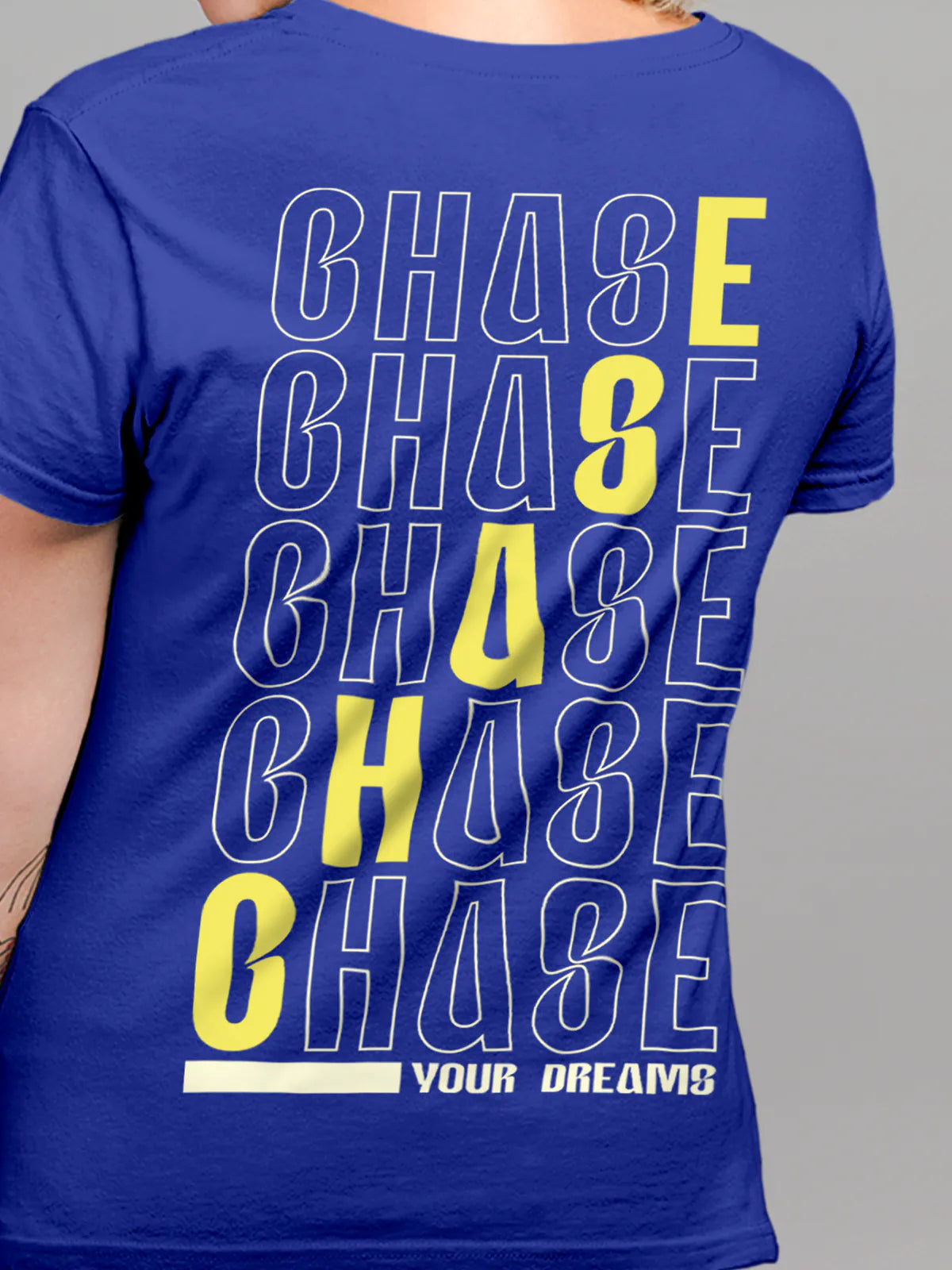 Close up of 'Chase Your Dreams' design on Women's Blue Round Neck T-shirt, highlighting intricate details and vibrant print.