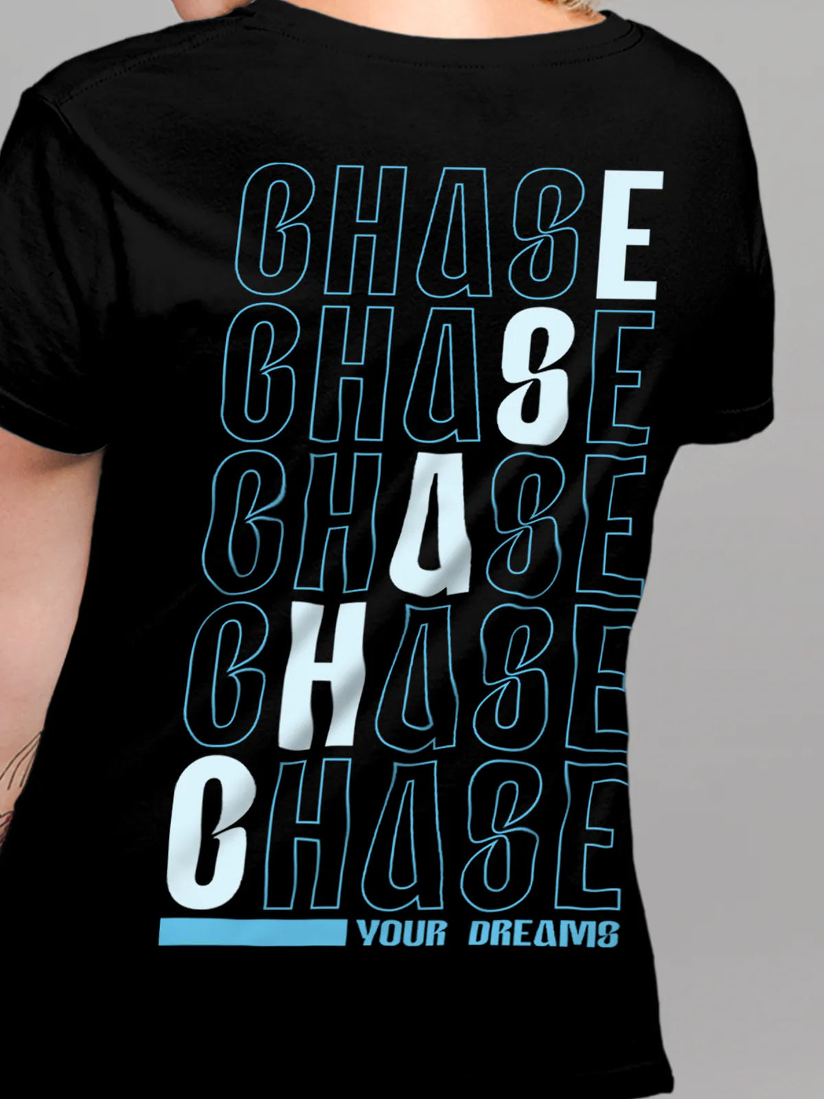 Close up of 'Chase Your Dreams' design on Women's Black Round Neck T-shirt, highlighting intricate details and vibrant print.