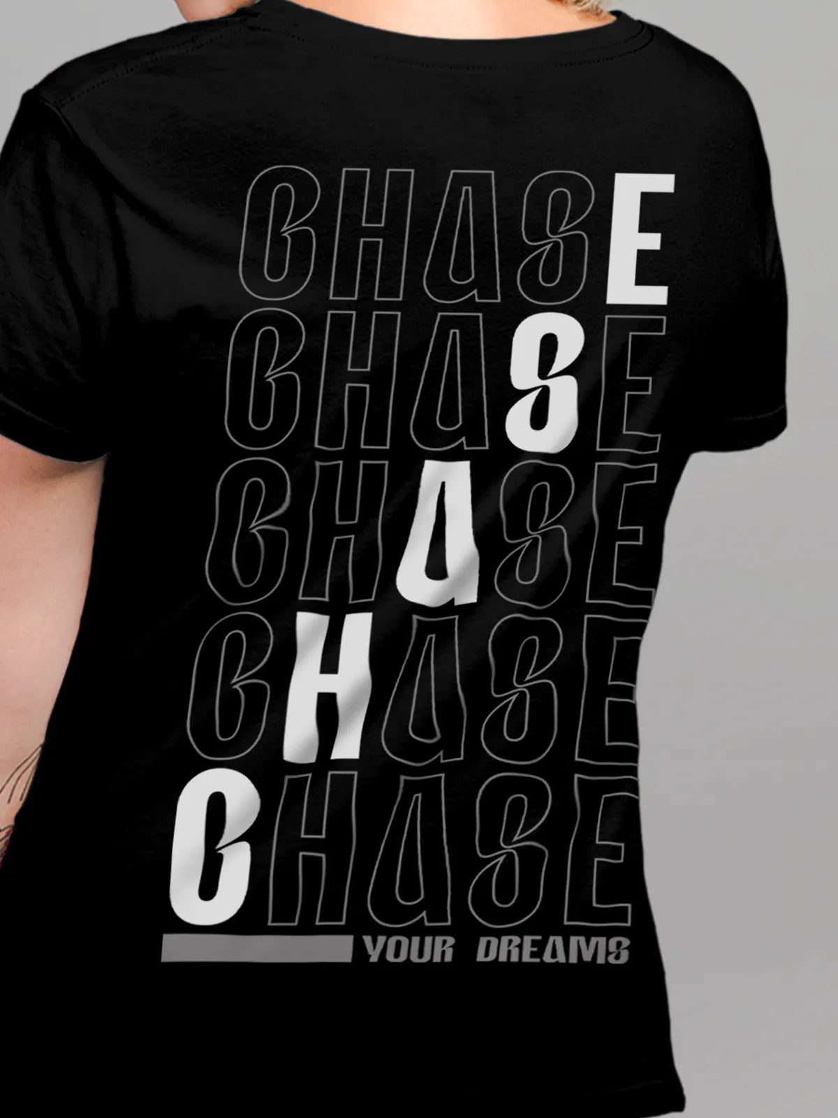 Close up of 'Chase Your Dreams' design on Women's Black Round Neck T-shirt, highlighting intricate details and vibrant print.