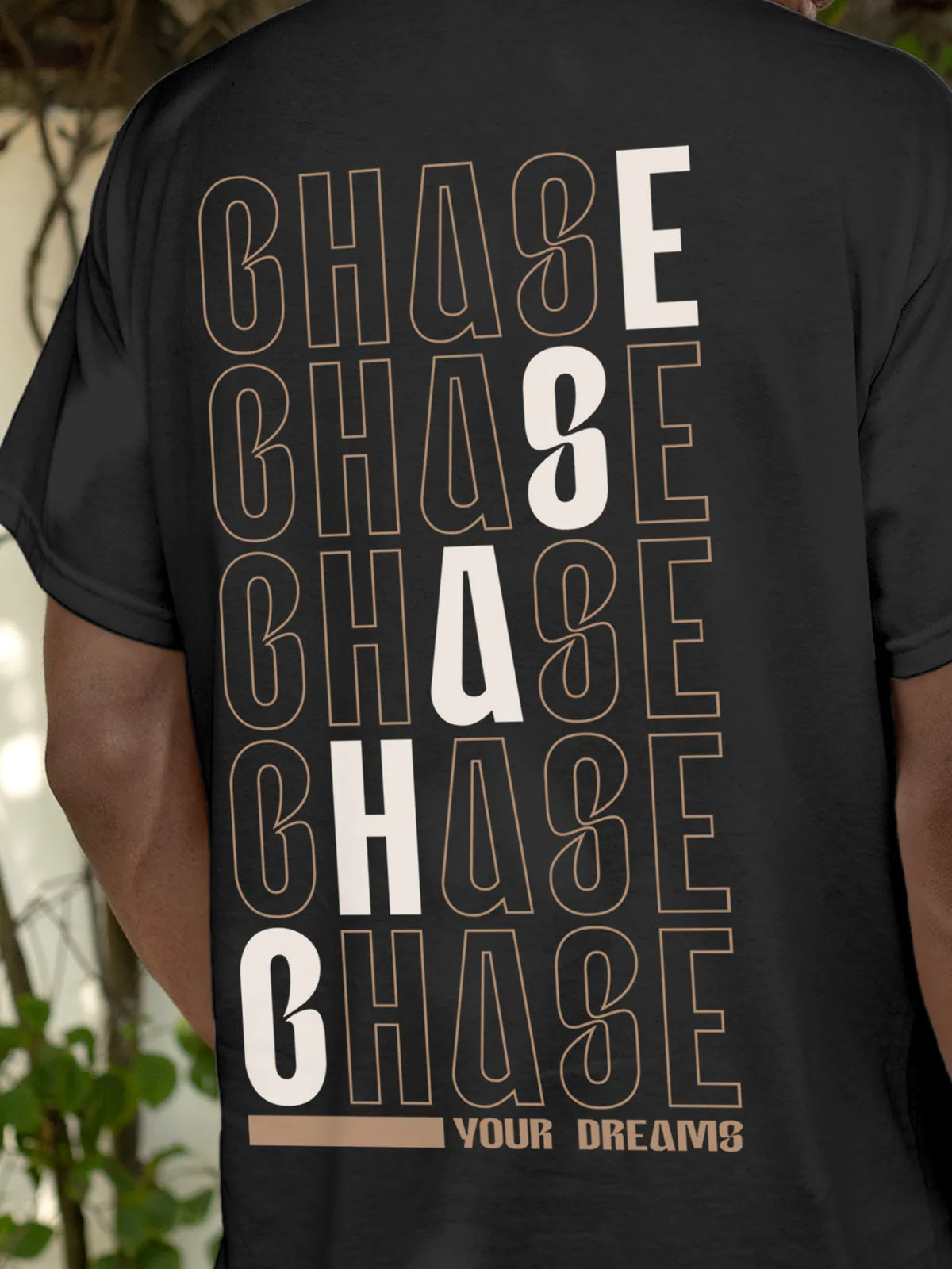 Close up of 'Chase Your Dreams' design on Men's Dark Grey Round Neck T-shirt, highlighting intricate details and vibrant print.