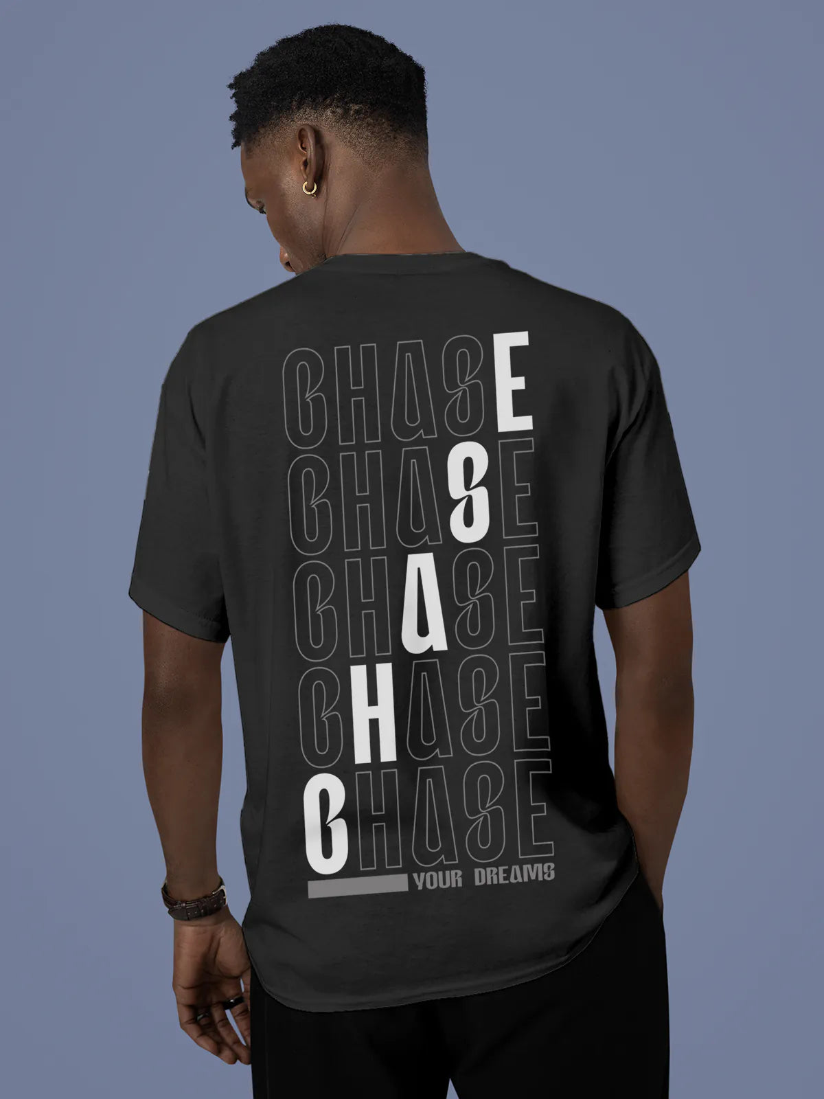 Model wearing Men's Dark Grey Round Neck T-shirt with 'Chase Your Dreams' design, offering effortless style and premium comfort