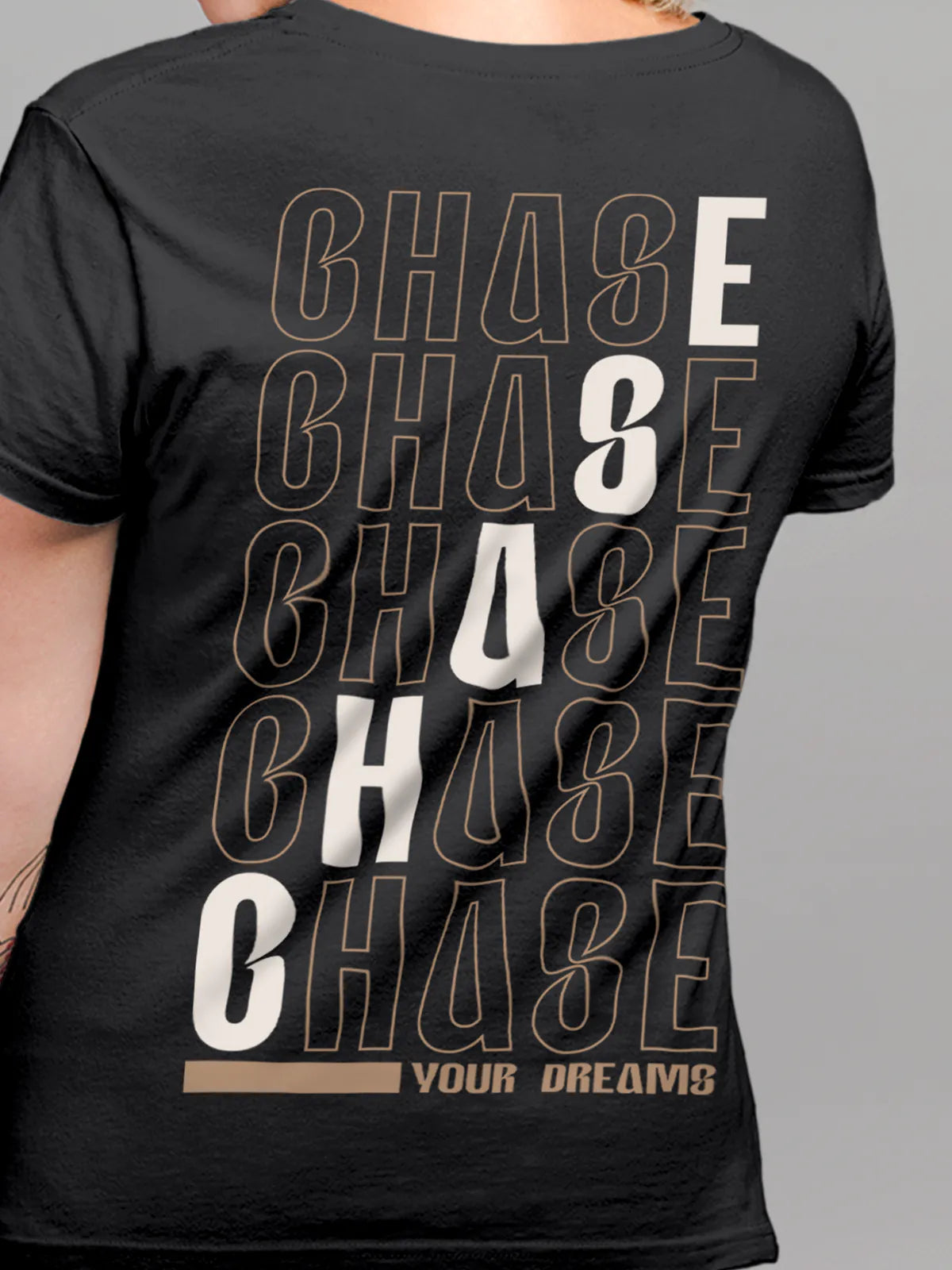 Close up of 'Chase Your Dreams' design on Women's Dark Grey Round Neck T-shirt, highlighting intricate details and vibrant print.