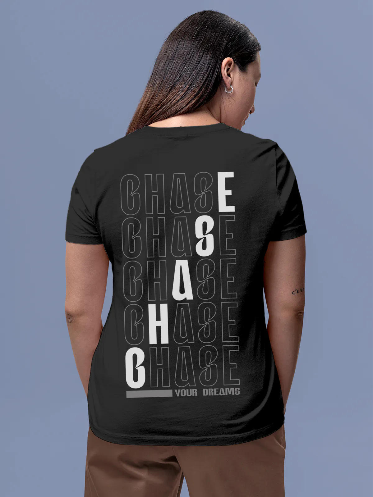 Model wearing Women's Dark Grey Round Neck T-shirt with 'Chase Your Dreams' design, offering effortless style and premium comfort