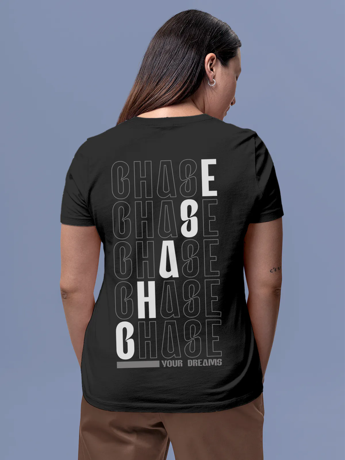 Model wearing Women's Dark Grey Round Neck T-shirt with 'Chase Your Dreams' design, offering effortless style and premium comfort