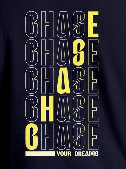 Close up of 'Chase Your Dreams' design on Men's Navy Blue Round Neck T-shirt, highlighting intricate details and vibrant print.