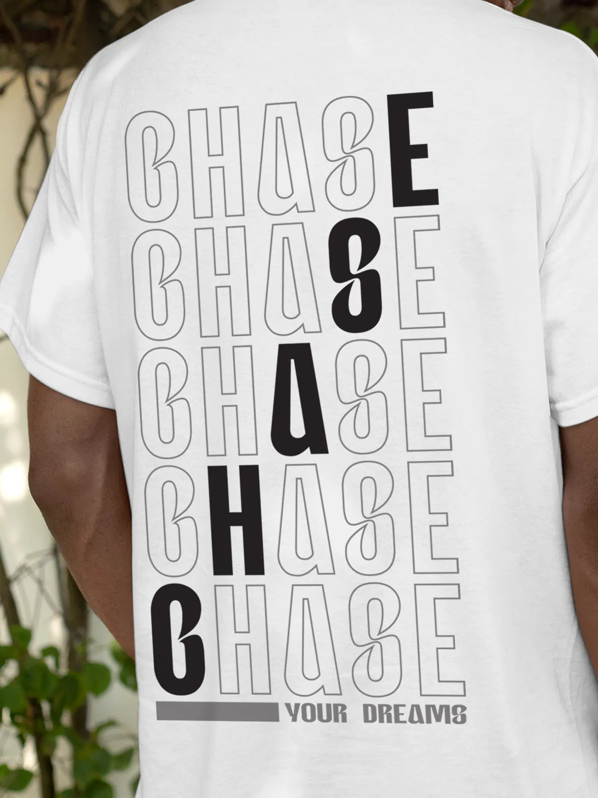 Close up of 'Chase Your Dreams' design on Men's White Round Neck T-shirt, highlighting intricate details and vibrant print.