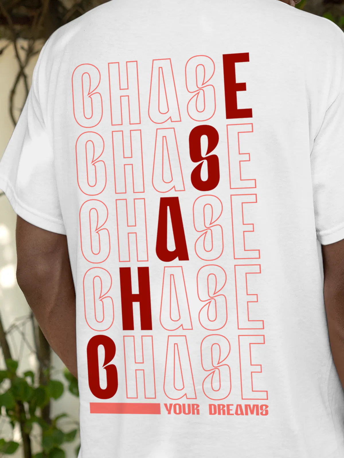 Close up of 'Chase Your Dreams' design on Men's White Round Neck T-shirt, highlighting intricate details and vibrant print.