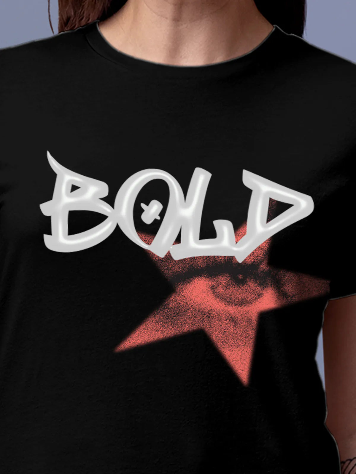 Close up of 'Bold' design on Women's Black Round Neck T-shirt, highlighting intricate details and vibrant print.