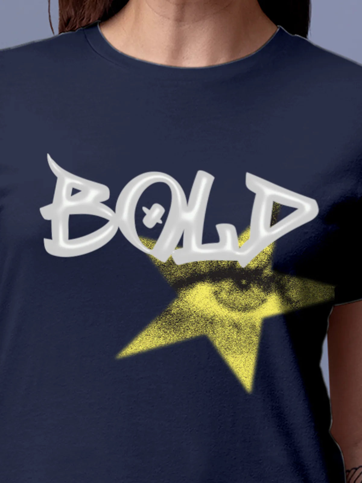 Close up of 'Bold' design on Women's Navy Blue Round Neck T-shirt, highlighting intricate details and vibrant print.