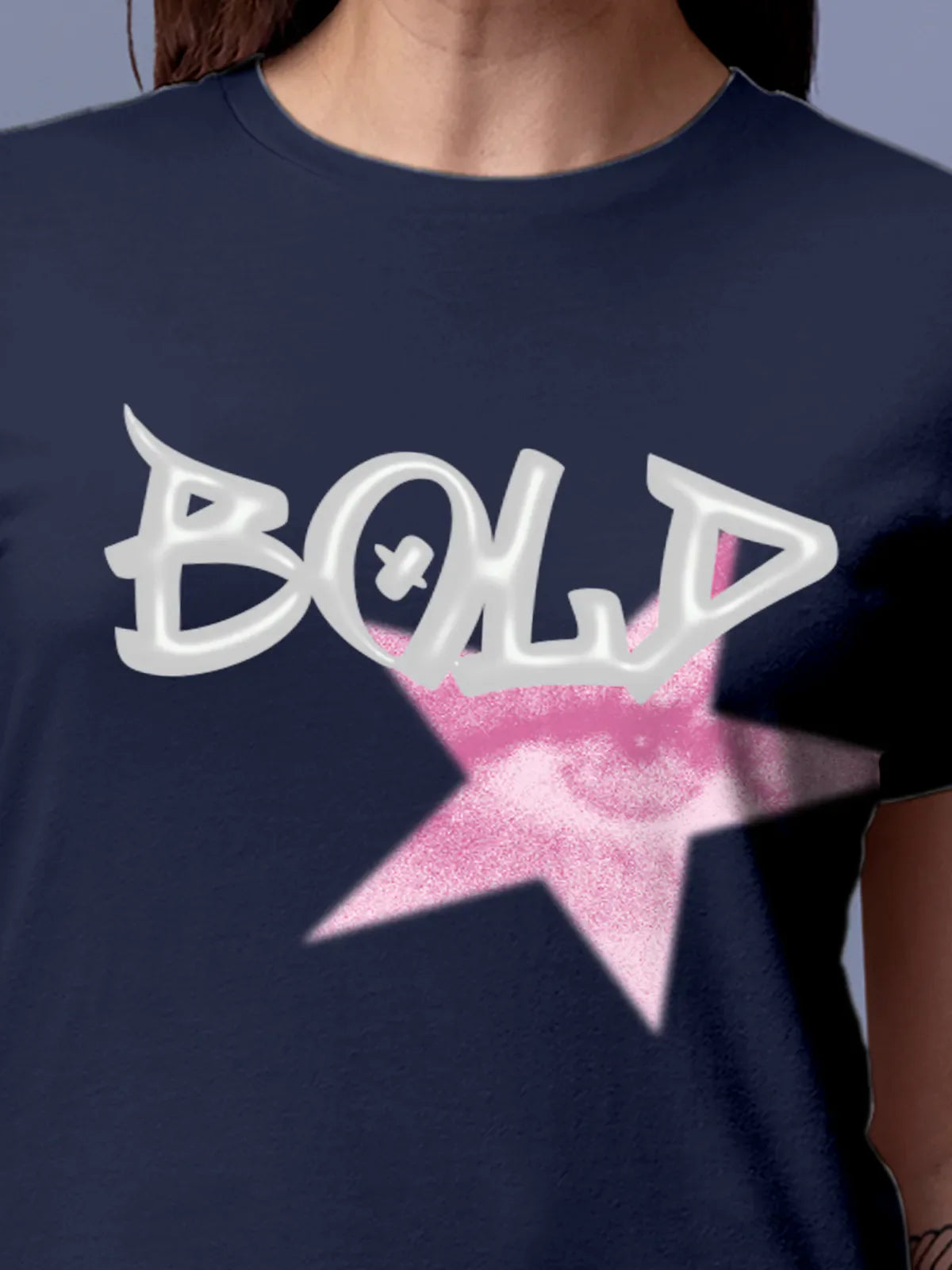 Close up of 'Bold' design on Women's Navy Blue Round Neck T-shirt, highlighting intricate details and vibrant print.