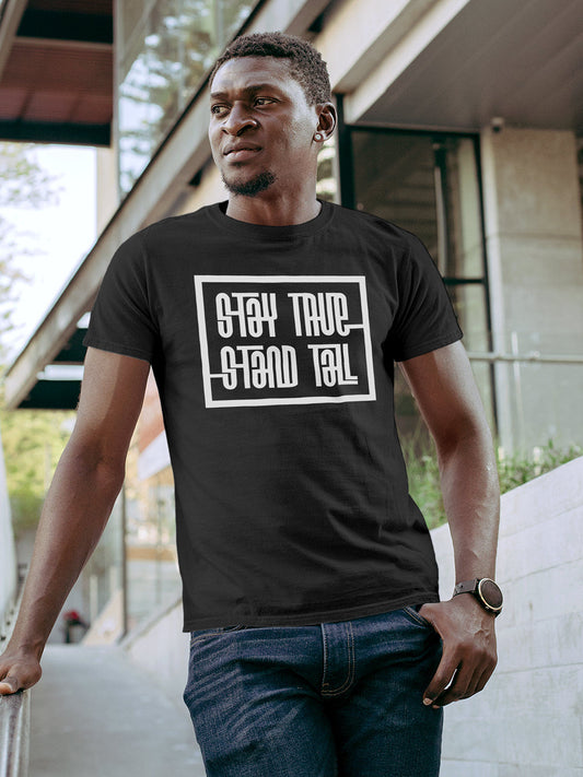 Model wearing Men's Dark Grey Round Neck T-shirt with 'Stay True Stand Tall' design, offering effortless style and premium comfort